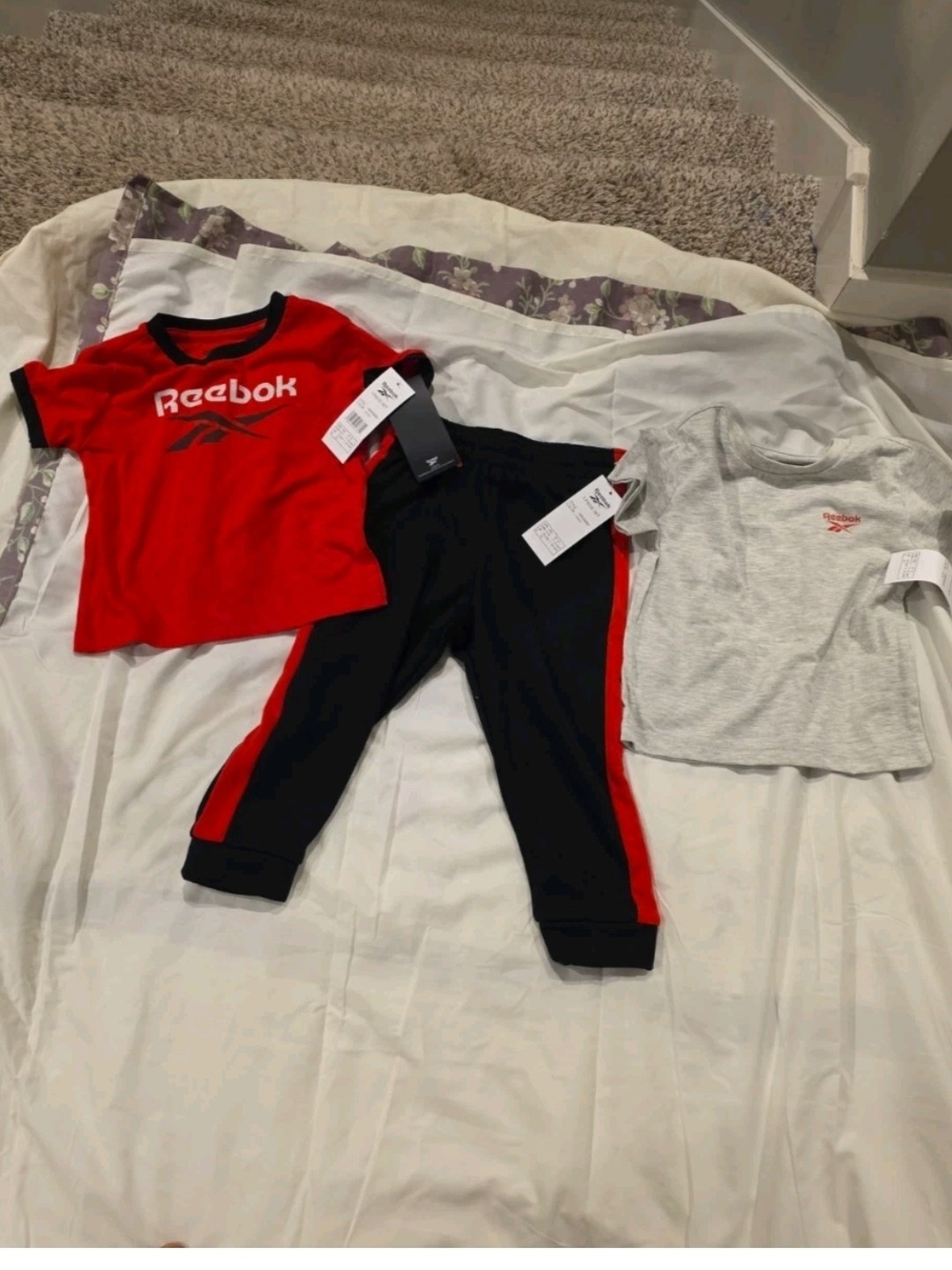 Reebok Kids Black Joggers with Red Side Stripe